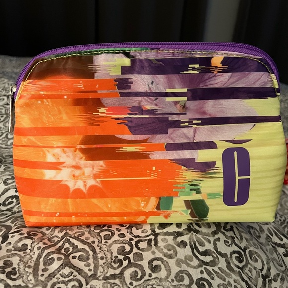 Clinique Handbags - Clinique Cosmetic Bag with Color Strip Printed New